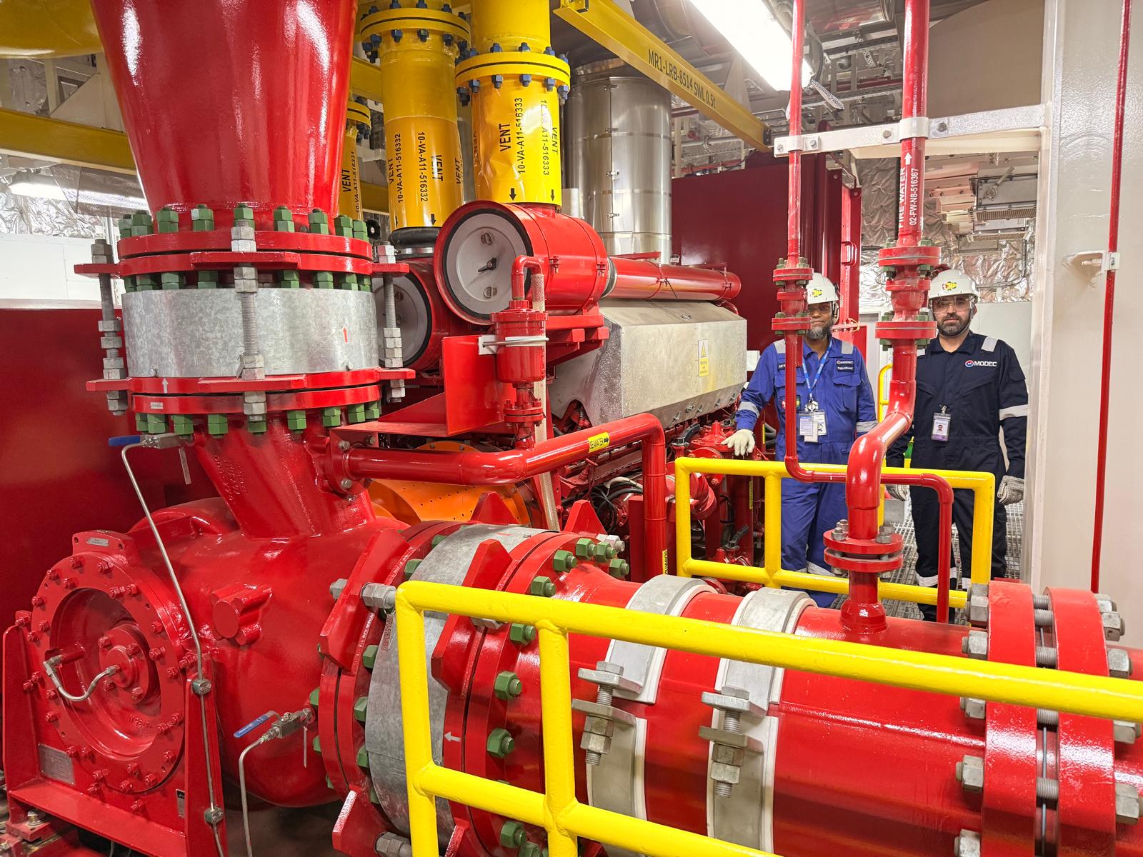 Deskely team inspecting industrial commissioning equipment on site